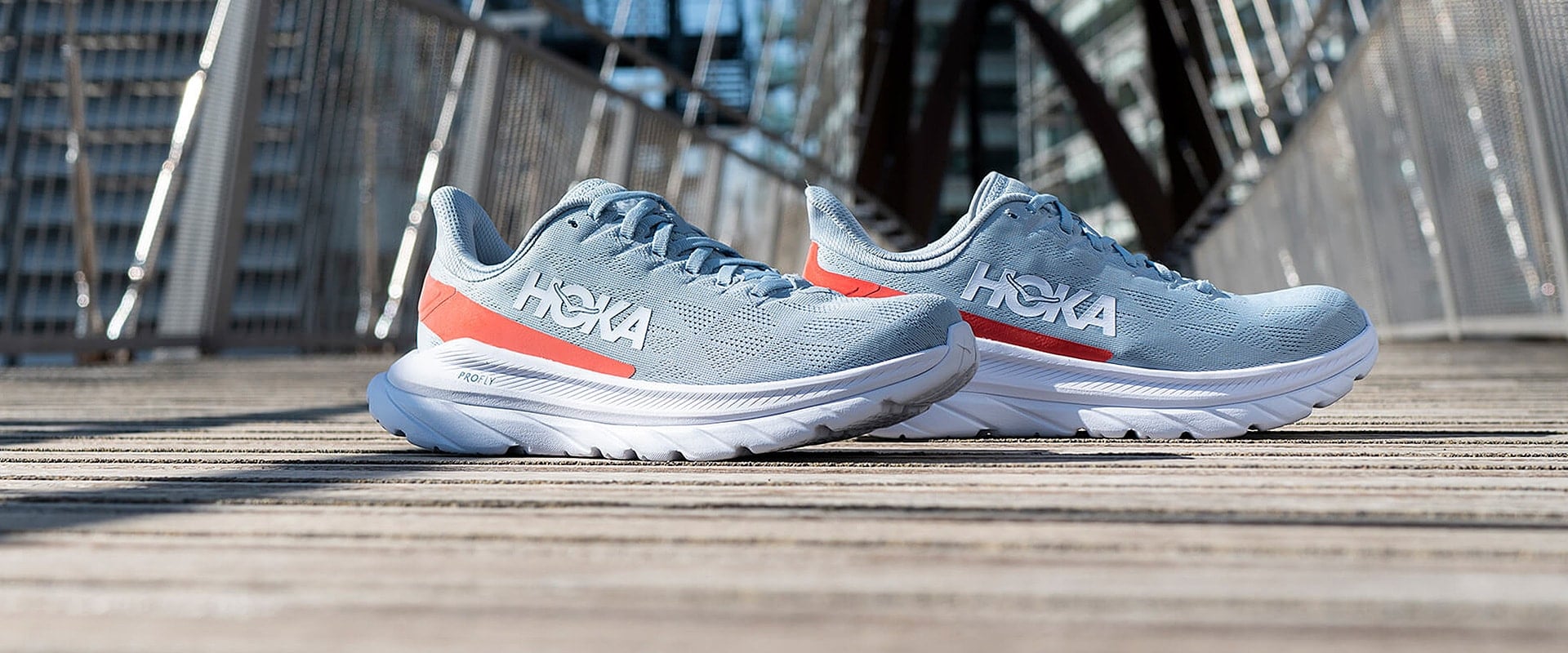 Hoka Mach 4 in Blue Fog/Fiesta color